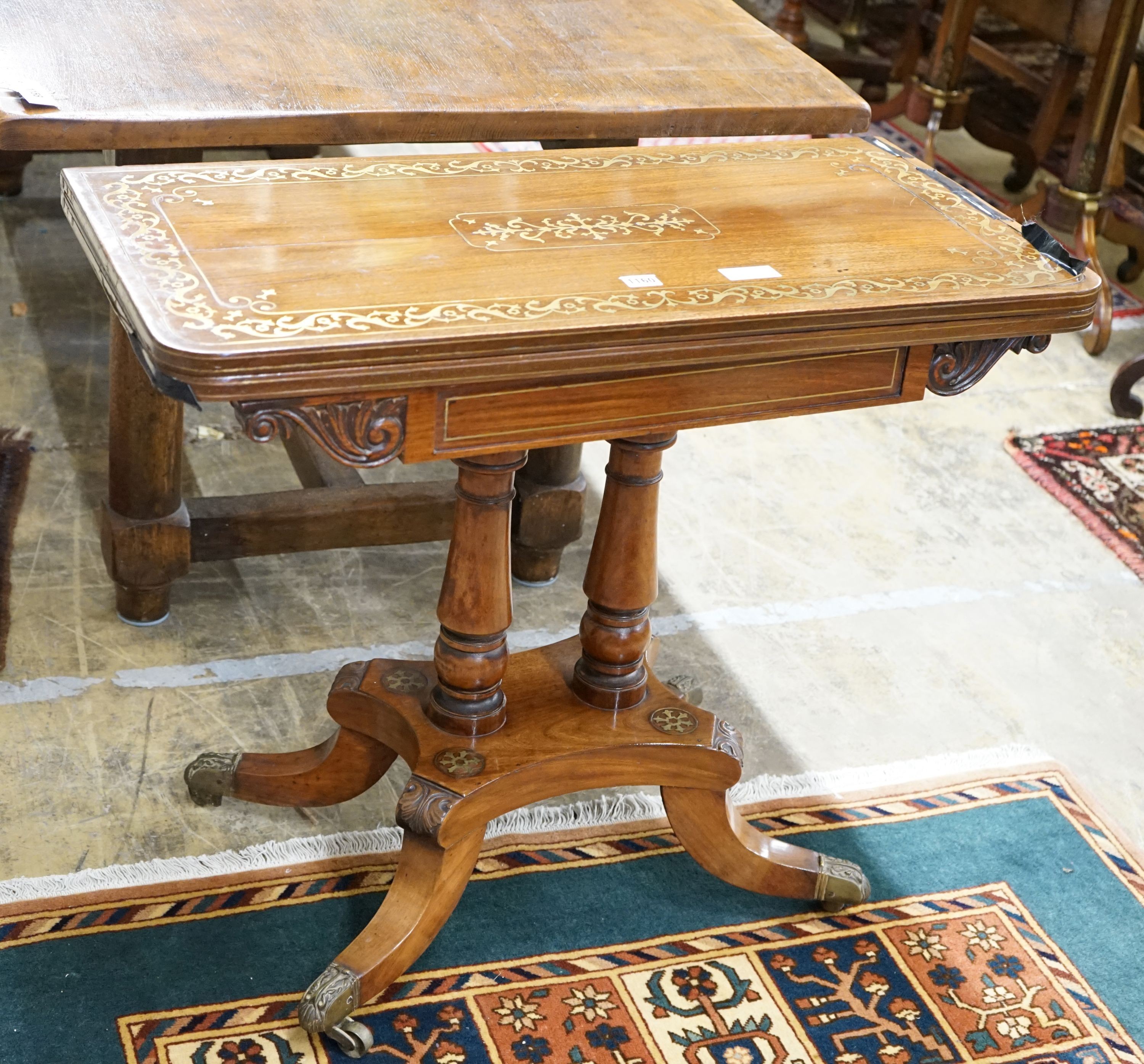A Regency brass inlaid mahogany rectangular folding card table, width 86cm, depth 43cm, height 74cm